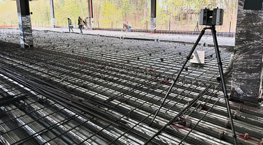 GTEC3d team performing laser scanning on a high-rise floor deck in Portland, Oregon, prior to concrete pour to verify as-built conditions.