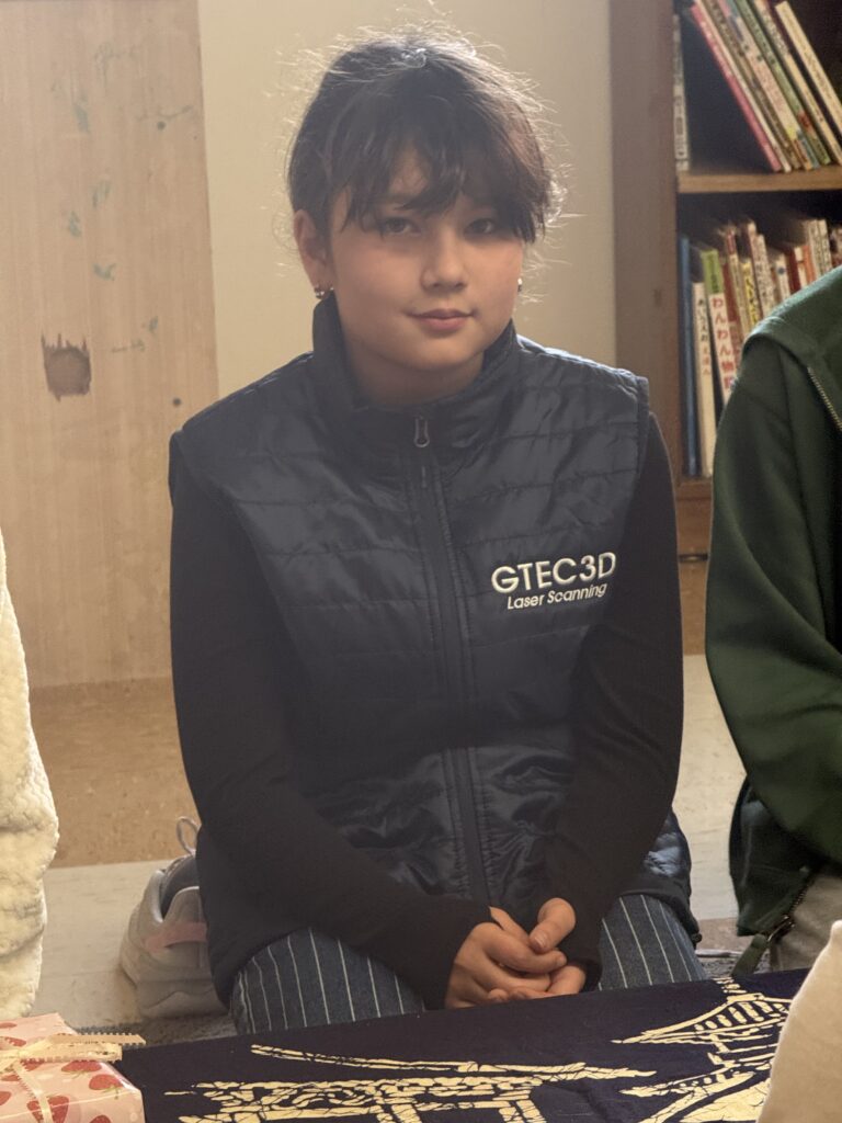 Momoko participating in a Japanese Tea Ceremony lesson at Richmond Elementary in Portland.